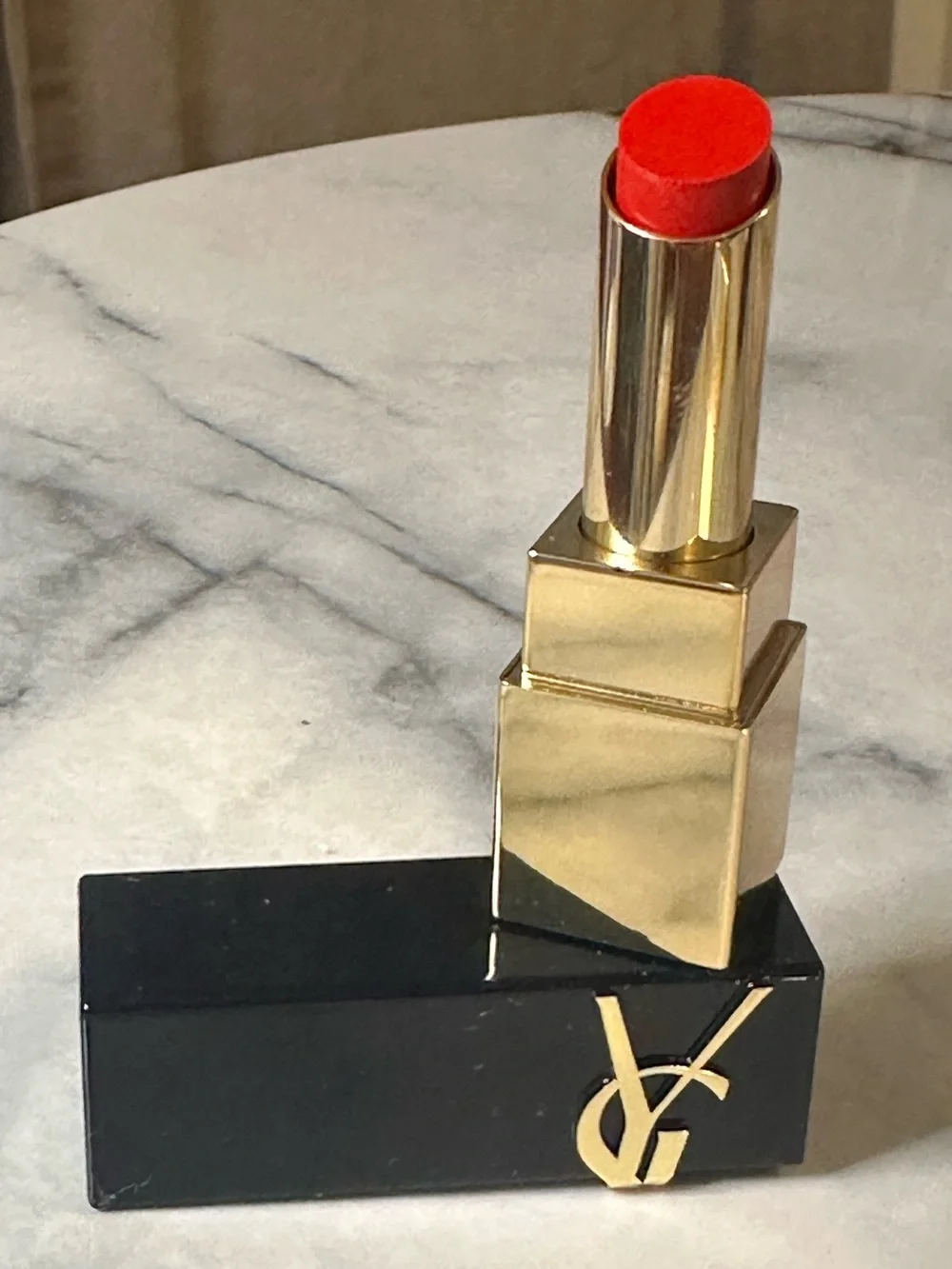 Yves Saint Laurent Gold & Black Tube Lipstick — Bright Red color “Wilful Red.”